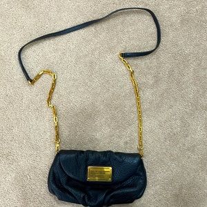 Need an easy, cute, going out bag - this is it!  Light and compact but fits alot